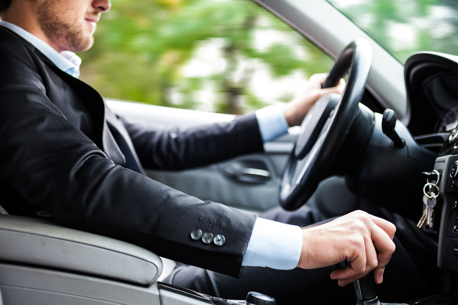 Chauffeur-driving-a-luxury-coach-car